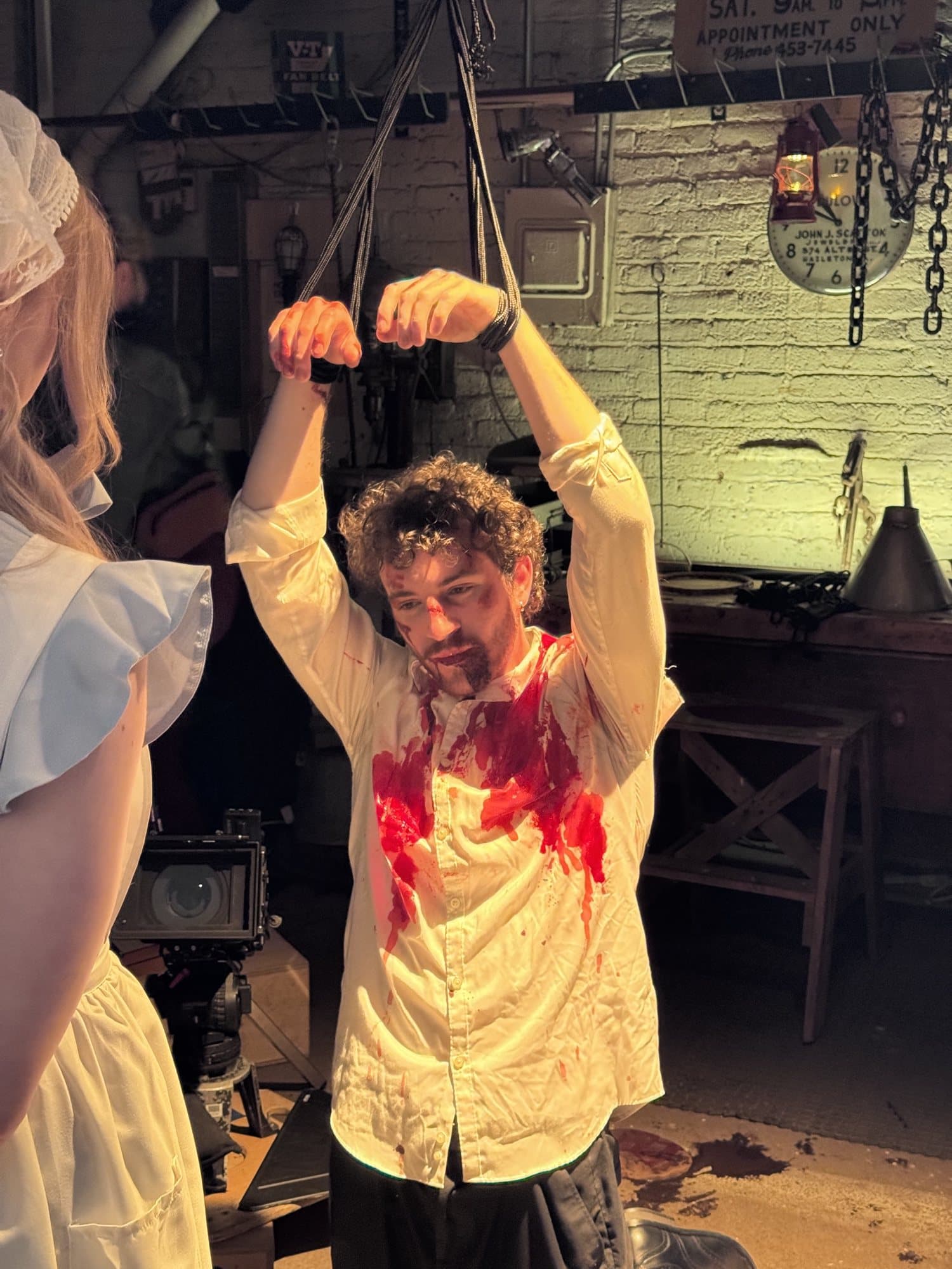 AJ DeAugustine in blood makeup on set