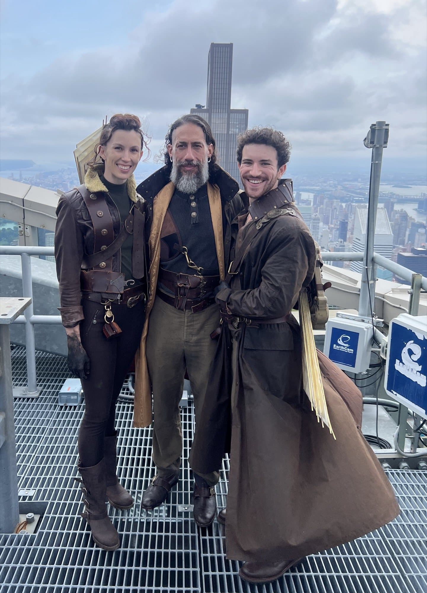 AJ DeAugustine in costume with castmates on a rooftop, on the set of Light Hunters